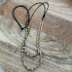 Beaded necklace on leather lace